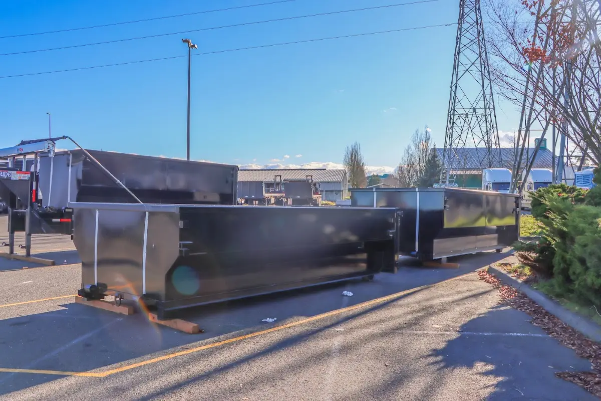 Roll-off dumpster ready for waste disposal at job site for 2 Yard Dumpster Rental in Lugoff